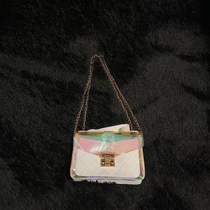 Small but casual metallic golden strap bag, it’s can be styled in many ways .